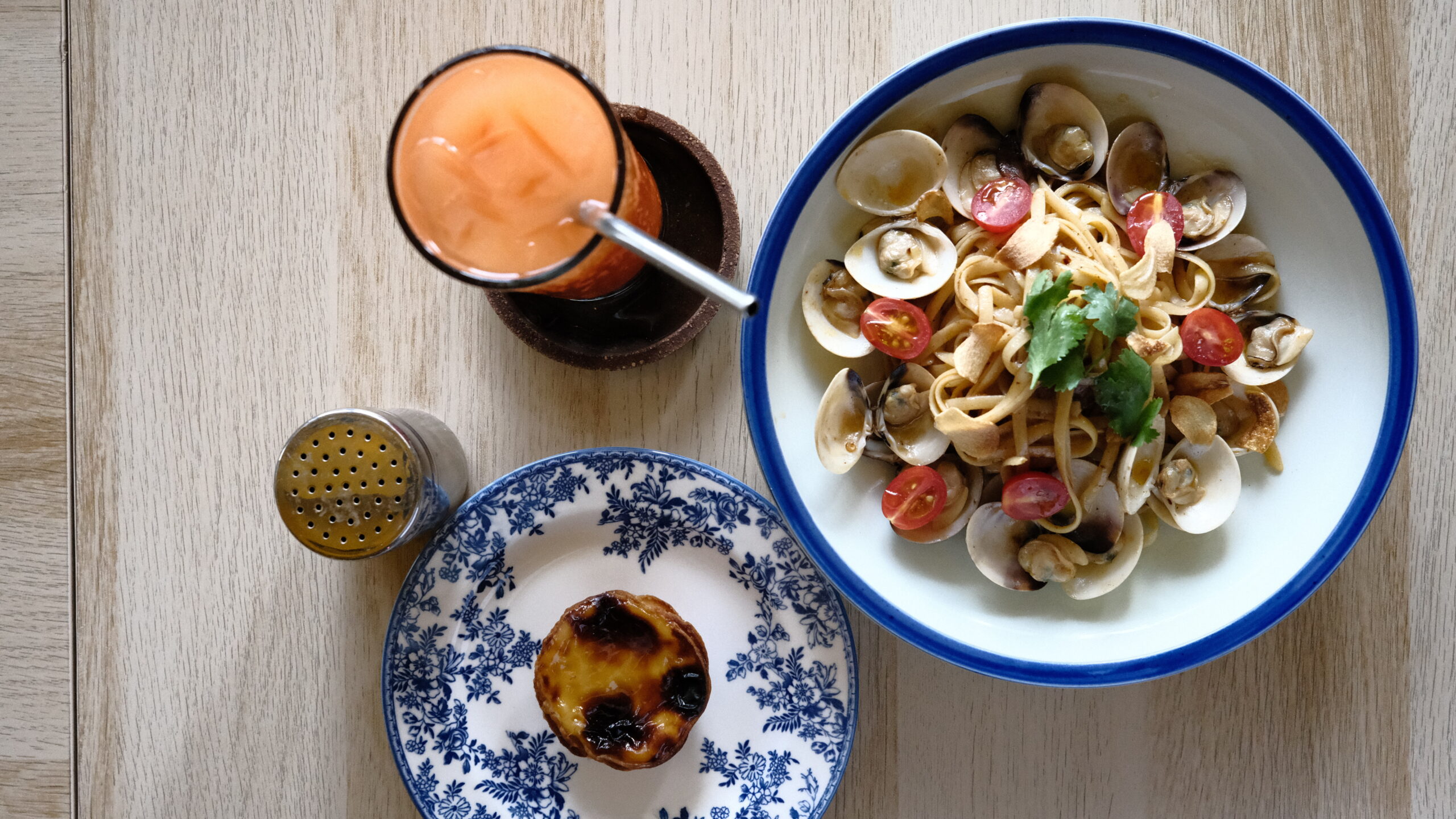 Clam pasta and pastel de nata at Bartolo