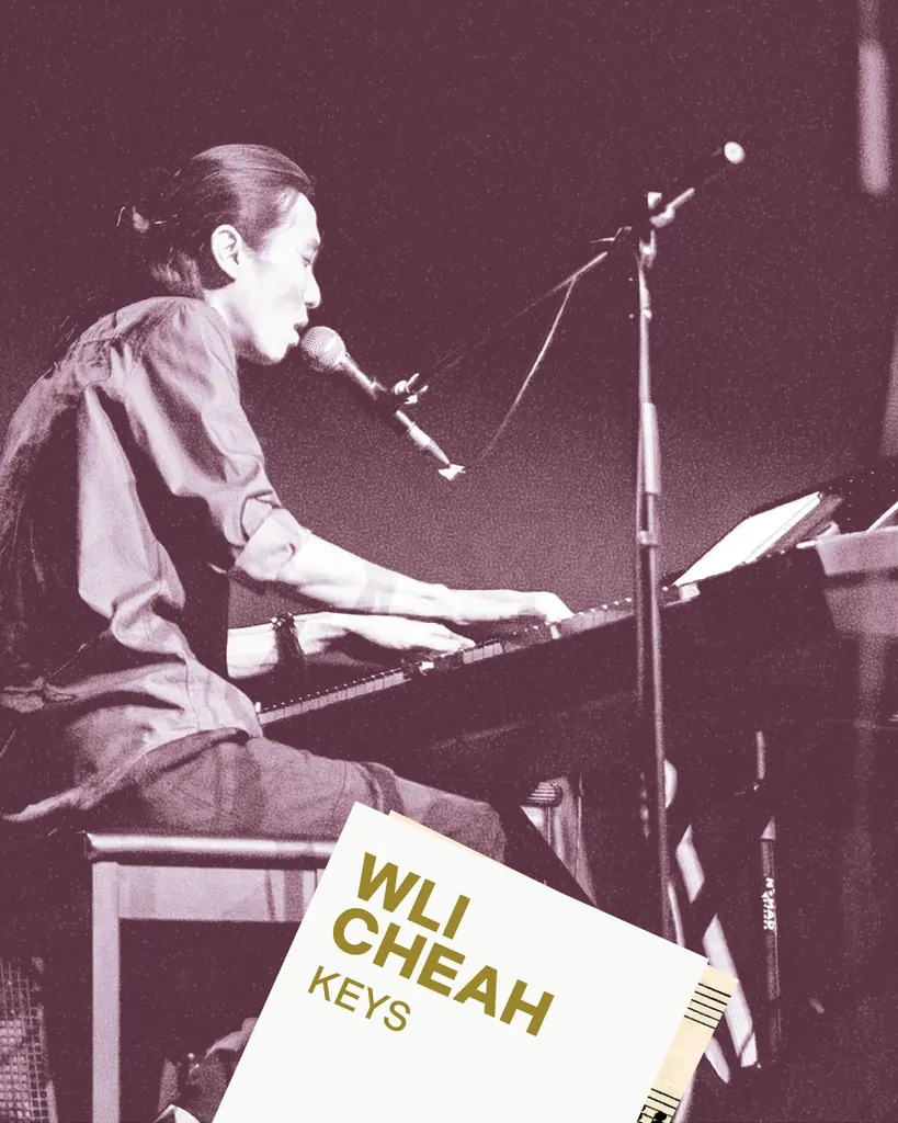 Wli Cheah on keys — live performance at Bartolo, with name card