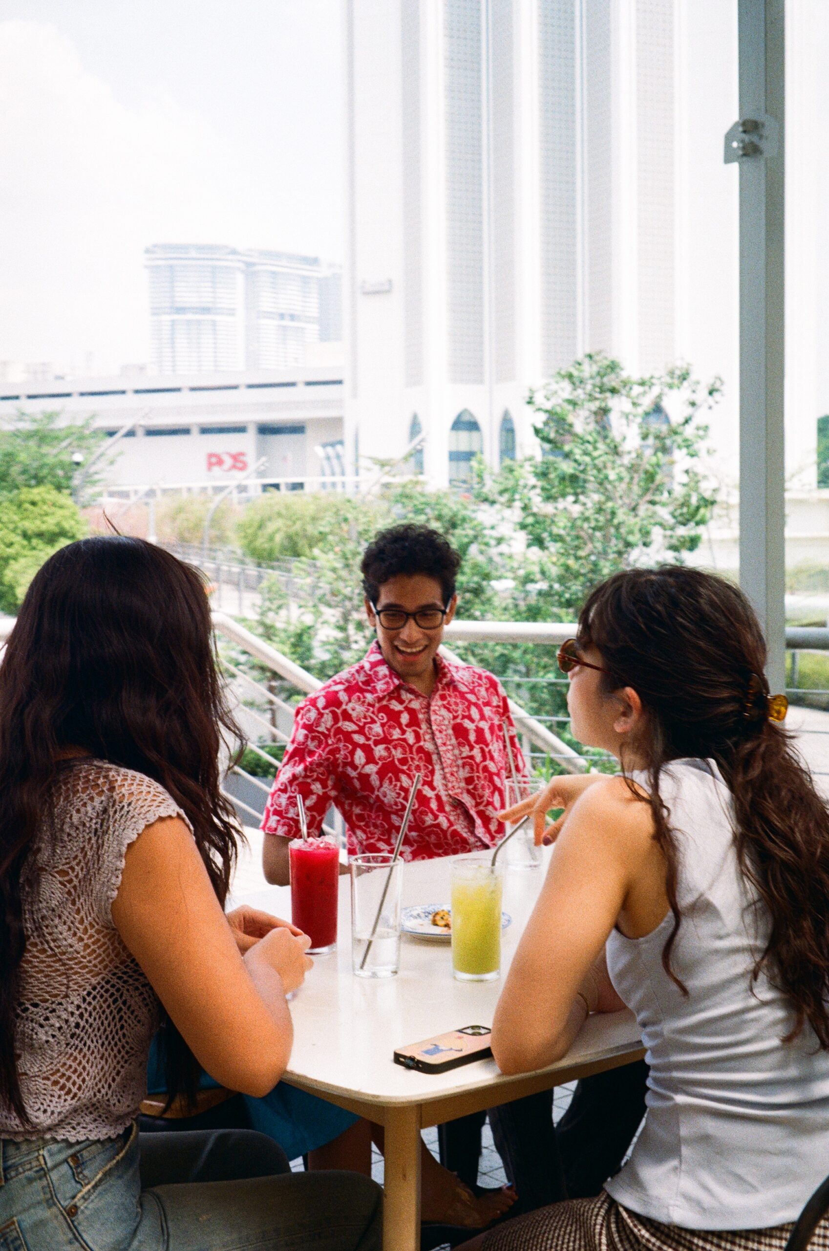 Friends dining on the Bartolo terrace