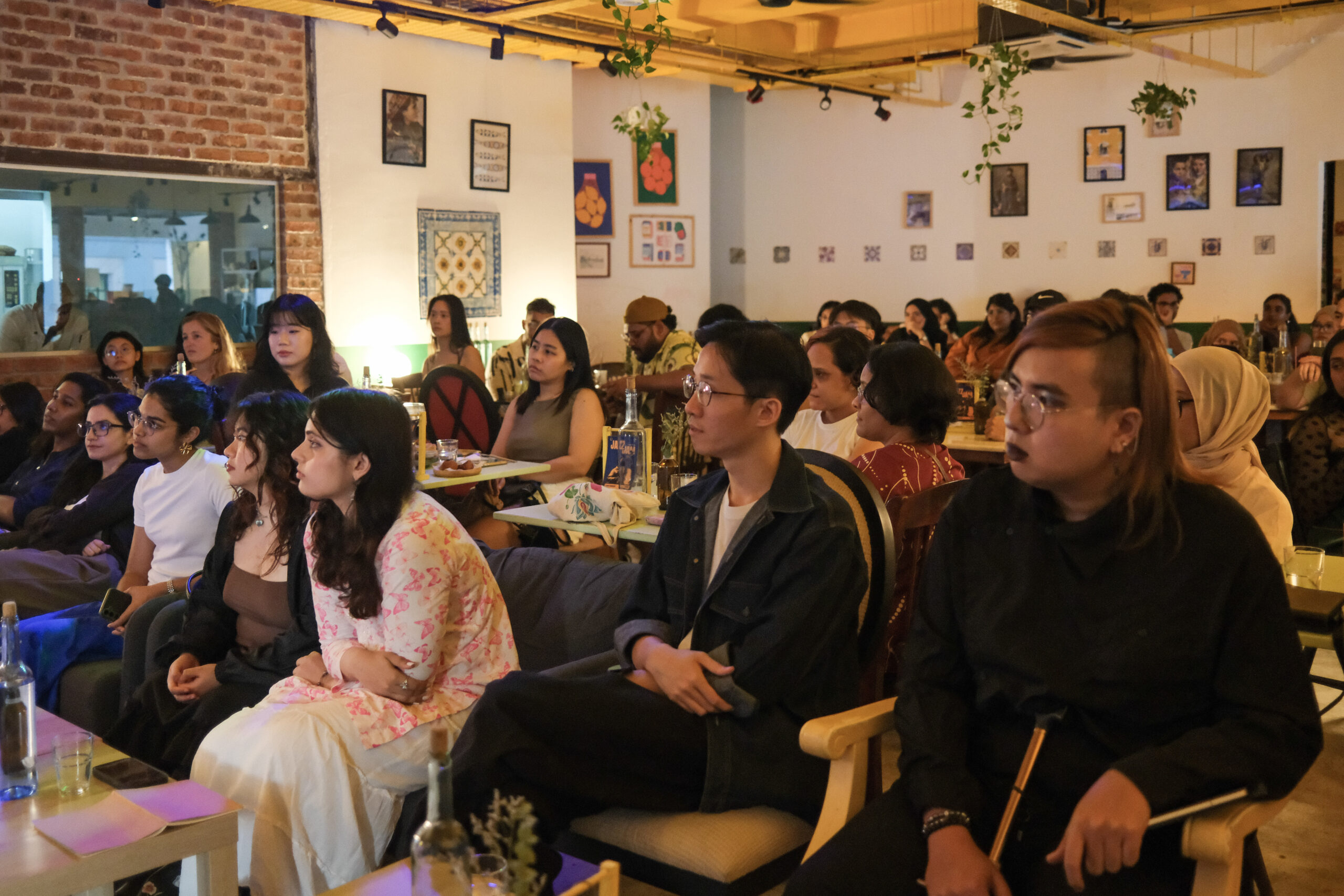Engaged audience at a Bartolo community event