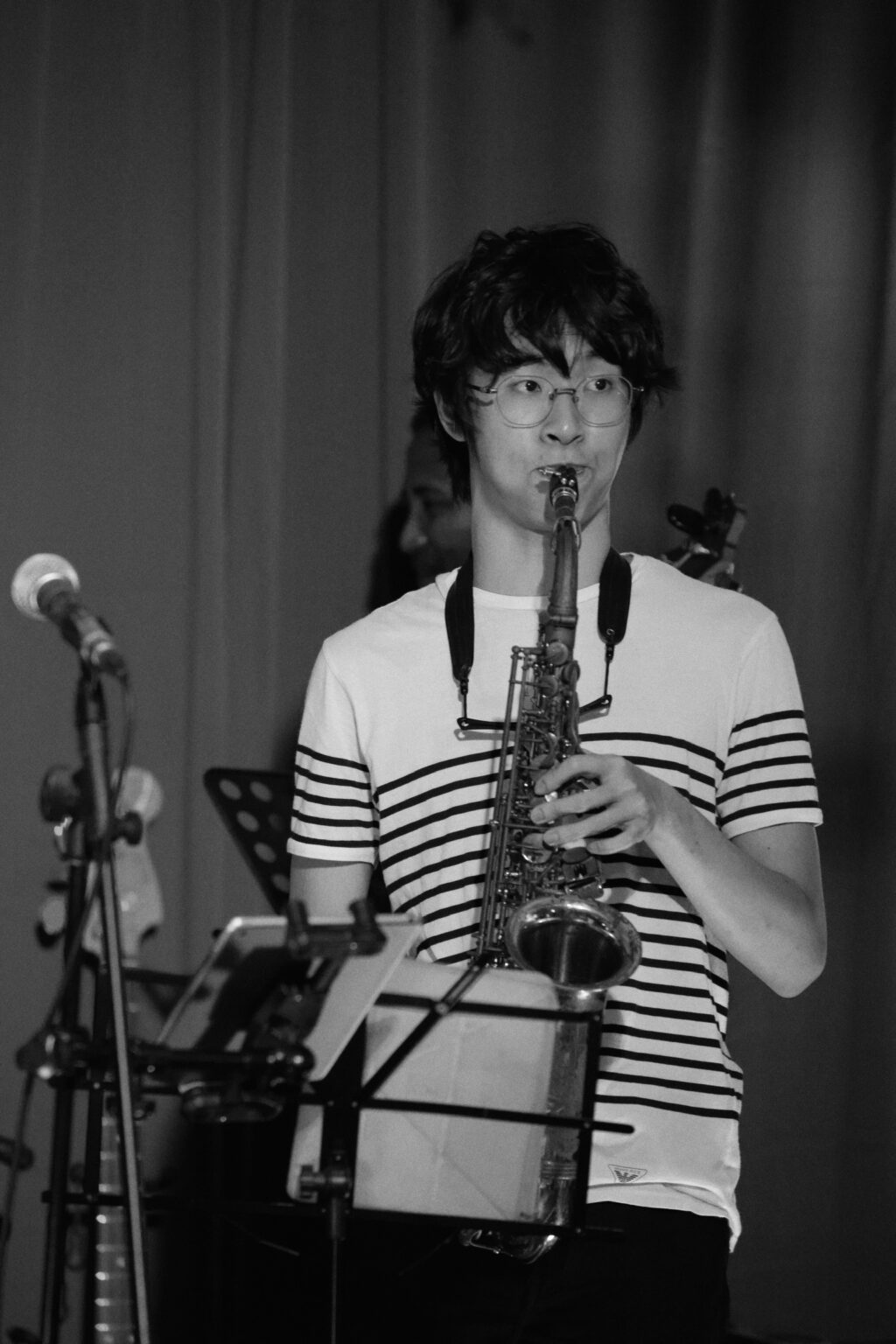 Saxophonist mid-performance, black-and-white, Bartolo Jazz Jam